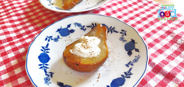 Half a baked pear filled with natural yogurt