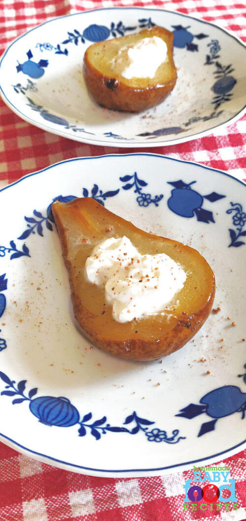 A freshly baked pear for baby, filled with yogurt