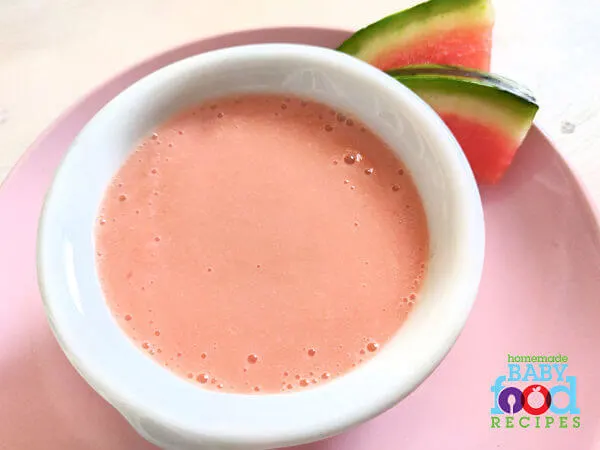 Banana and melon baby food with slices of watermelon