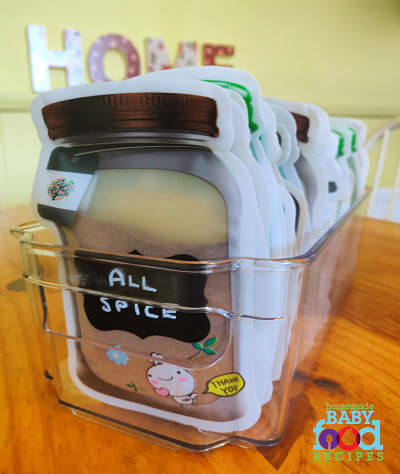 Spices and herbs neatly arranged alphabetically in mason jar bags