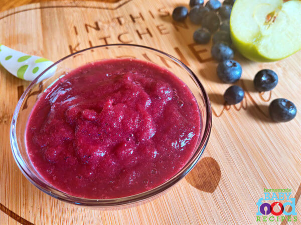 A bowl of blueberry and apple puree for baby
